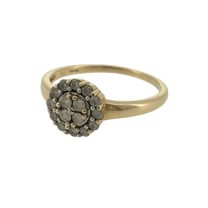 Add an elegant touch to your jewellery collection with this pre-owned 9ct yellow gold and diamond round cluster ring, featuring a beautiful circular diamond setting in a classic warm gold finish.

Design: The ring features a traditional round cluster design, with diamonds arranged together to create an attractive and timeless appearance.
Material: Made from 9ct yellow gold, offering a classic warm gold finish that beautifully complements the diamond setting.