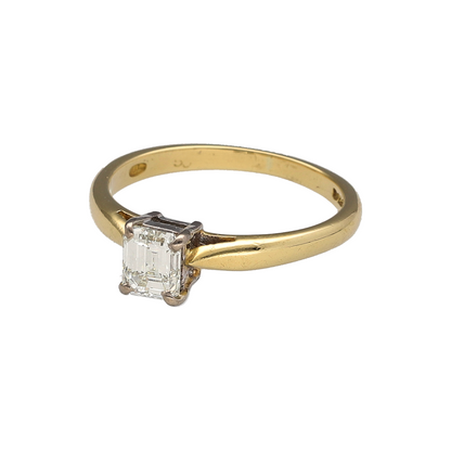 Showcasing refined elegance and exceptional diamond beauty, this pre-owned 18ct yellow gold emerald-cut diamond solitaire ring is a timeless piece that perfectly balances classic luxury with sophisticated styling. Featuring a stunning emerald-cut diamond as its focal point, this ring offers understated glamour and enduring appeal.

Design: The ring centres around a beautiful emerald-cut diamond, admired for its elegant rectangular shape and distinctive step-cut facets.