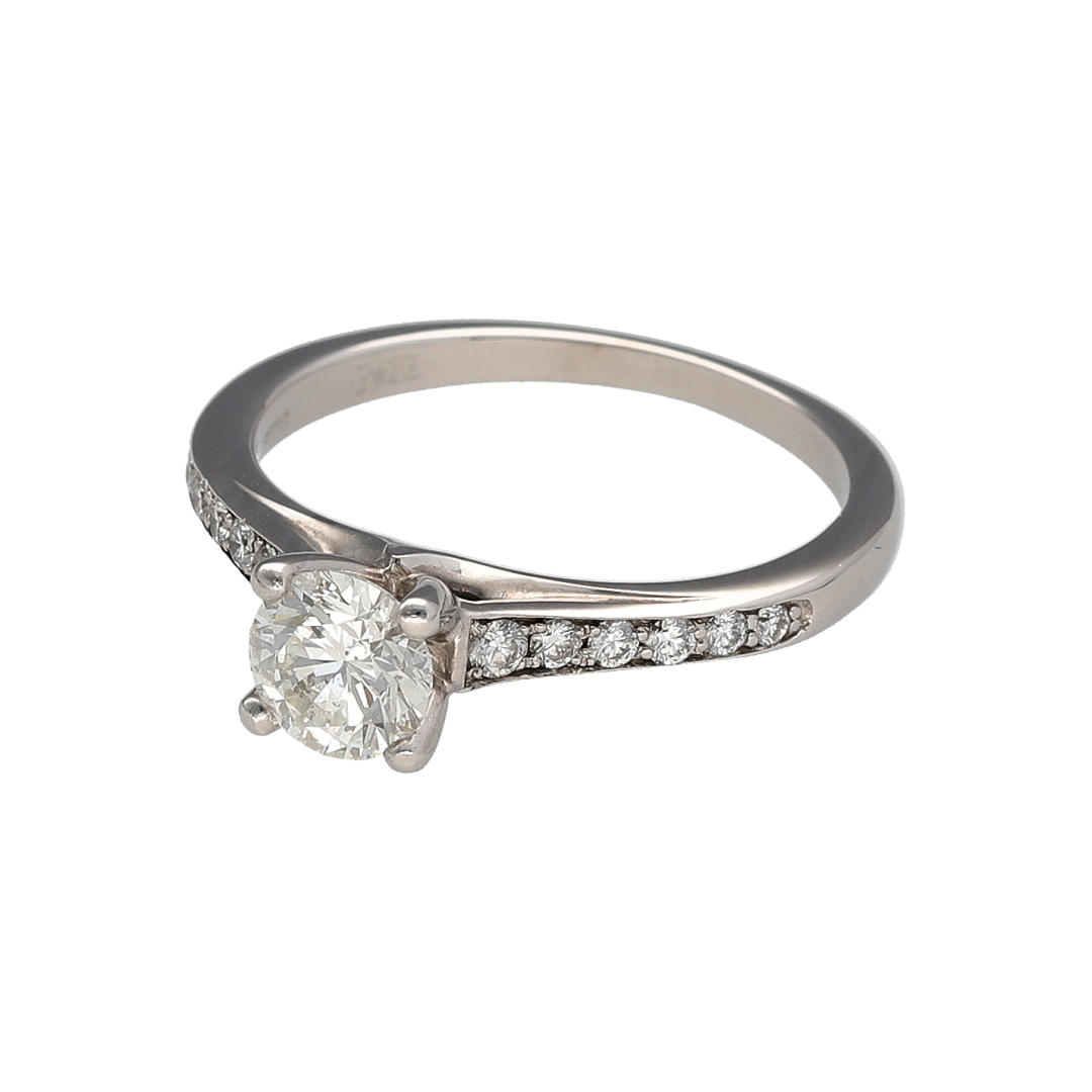 Exude timeless elegance with this pre-owned 18ct white gold diamond solitaire ring. Featuring an impressive brilliant-cut centre diamond complemented by diamond-set shoulders, this beautifully crafted ring offers exceptional sparkle and classic sophistication.

Design: The ring showcases a stunning brilliant-cut centre diamond, enhanced by diamond-set shoulders that add extra brilliance and beautifully frame the focal stone.