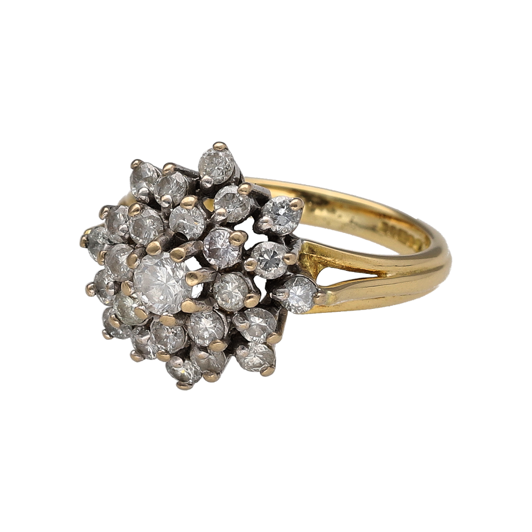 Make a bold and glamorous statement with this pre-owned 18ct yellow gold multi-stone diamond flower cluster ring. Featuring an impressive floral-inspired cluster design set with a remarkable collection of diamonds, this luxurious ring offers exceptional sparkle and timeless elegance.

Design: The ring showcases a striking flower cluster design measuring approximately 15mm in height across the front.