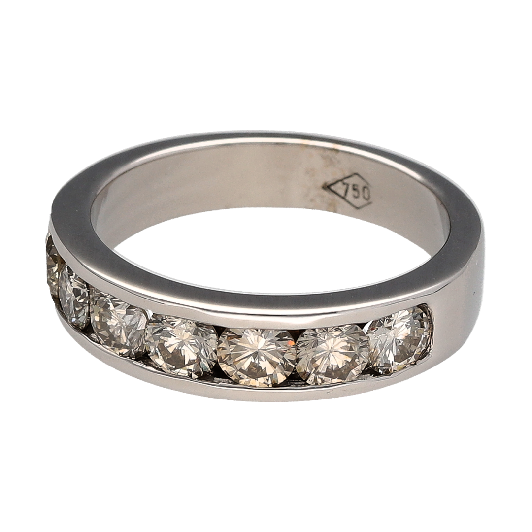 Add timeless sophistication and refined sparkle to your fine jewellery collection with this pre-owned 18ct white gold diamond band ring, featuring seven diamonds set across a substantial and elegant design.

Design: The ring showcases a classic band design set with seven sparkling diamonds across the front, creating a beautifully balanced display of brilliance.