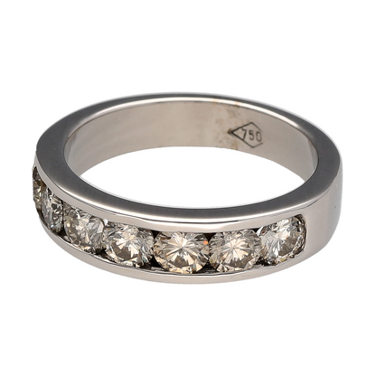 Add timeless sophistication and refined sparkle to your fine jewellery collection with this pre-owned 18ct white gold diamond band ring, featuring seven diamonds set across a substantial and elegant design.

Design: The ring showcases a classic band design set with seven sparkling diamonds across the front, creating a beautifully balanced display of brilliance.