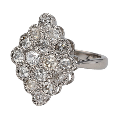 Add vintage-inspired elegance and impressive sparkle to your jewellery collection with this pre-owned platinum and diamond pavé set marquise-shaped ring, featuring a striking statement design set with sixteen brilliant cut diamonds.

Design: The ring showcases an eye-catching vintage-style marquise-shaped profile with a large decorative front, creating an elegant statement appearance enhanced by intricate pavé set diamond detailing.