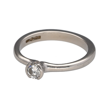 Add timeless luxury and refined brilliance to your jewellery collection with this pre-owned platinum and diamond solitaire ring, featuring a certified 0.28ct brilliant-cut diamond with E colour and SI2 clarity—perfect as a classic engagement ring, proposal ring, anniversary gift, or sophisticated piece of fine jewellery.

Design: The ring features a classic solitaire design centred with a single brilliant-cut diamond, creating an elegant and timeless appearance that allows the diamond