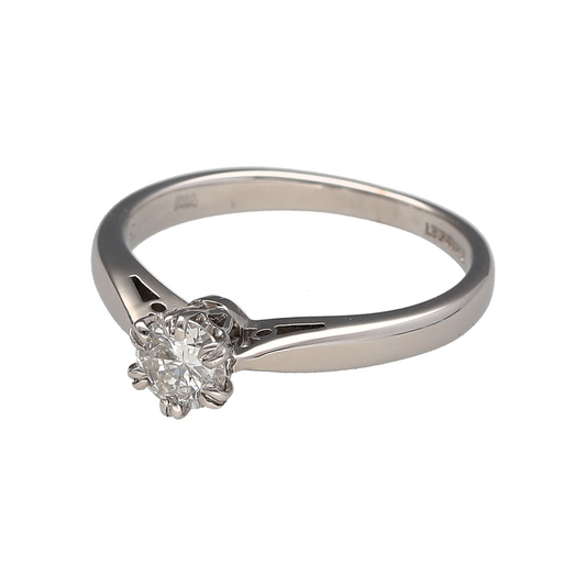Add timeless luxury and classic sparkle to your jewellery collection with this pre-owned 18ct white gold and diamond solitaire ring, featuring a brilliant-cut diamond of approximately 0.33ct—perfect as a traditional engagement ring, anniversary gift, or sophisticated piece of fine jewellery.

Design: The ring features a classic solitaire design centred with a single brilliant-cut diamond, creating an elegant and timeless appearance that allows the diamond to remain the main focal point.