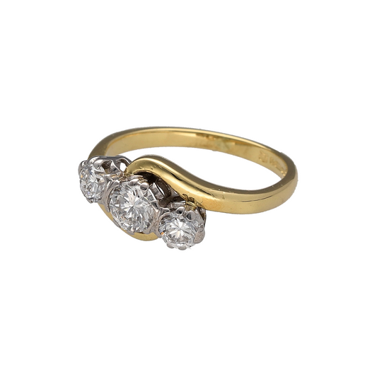 This pre-owned 18ct yellow gold diamond trilogy twist ring is an elegant three stone design, featuring approximately 0.72ct of diamond content in total.

Design: Featuring three diamonds arranged in a classic trilogy setting with a twist-style design, this ring combines a traditional three stone look with flowing yellow gold detailing.
Material: Made from 18-carat yellow gold.
Gemstone Detail: Approximately 0.72ct of diamond content set in total with approximate SI clarity.