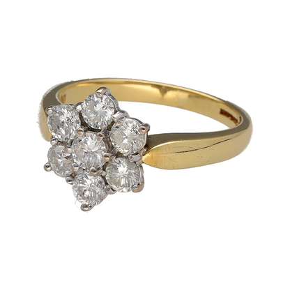 This pre-owned 18ct yellow gold diamond flower cluster ring is a striking design, featuring seven brilliant cut diamonds arranged in a floral-style cluster.

Design: Featuring a flower-shaped cluster made up of seven brilliant cut diamonds, this ring combines a classic floral design with the warm finish of 18ct yellow gold.
Material: Made from 18-carat yellow gold.
Gemstone Detail: Seven brilliant cut diamonds with approximately 1ct of diamond content in total and approximate SI clarity.