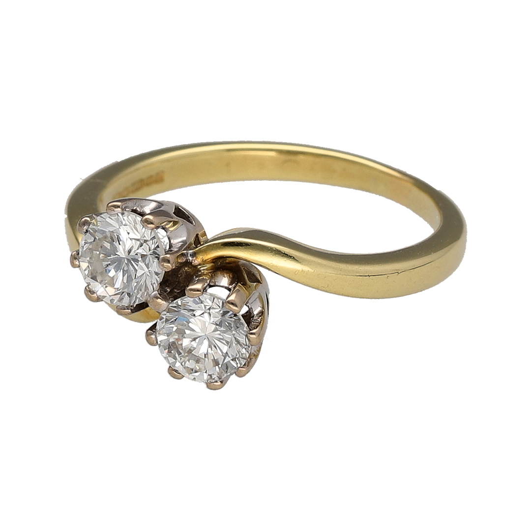 This pre-owned 18ct yellow gold double diamond twist ring is a striking design, featuring two brilliant cut diamonds within a flowing twist setting.

Design: Featuring two brilliant cut diamonds set within a twist-style design, this ring combines a distinctive setting with the warm finish of 18ct yellow gold.
Material: Made from 18-carat yellow gold.
Gemstone Detail: Two brilliant cut diamonds with approximately 0.92ct to 1ct of diamond content in total.
Ring Detail: Double diamond twist-style design.