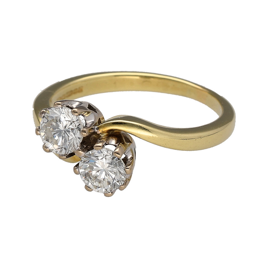 This pre-owned 18ct yellow gold double diamond twist ring is a striking design, featuring two brilliant cut diamonds within a flowing twist setting.

Design: Featuring two brilliant cut diamonds set within a twist-style design, this ring combines a distinctive setting with the warm finish of 18ct yellow gold.
Material: Made from 18-carat yellow gold.
Gemstone Detail: Two brilliant cut diamonds with approximately 0.92ct to 1ct of diamond content in total.
Ring Detail: Double diamond twist-style design.