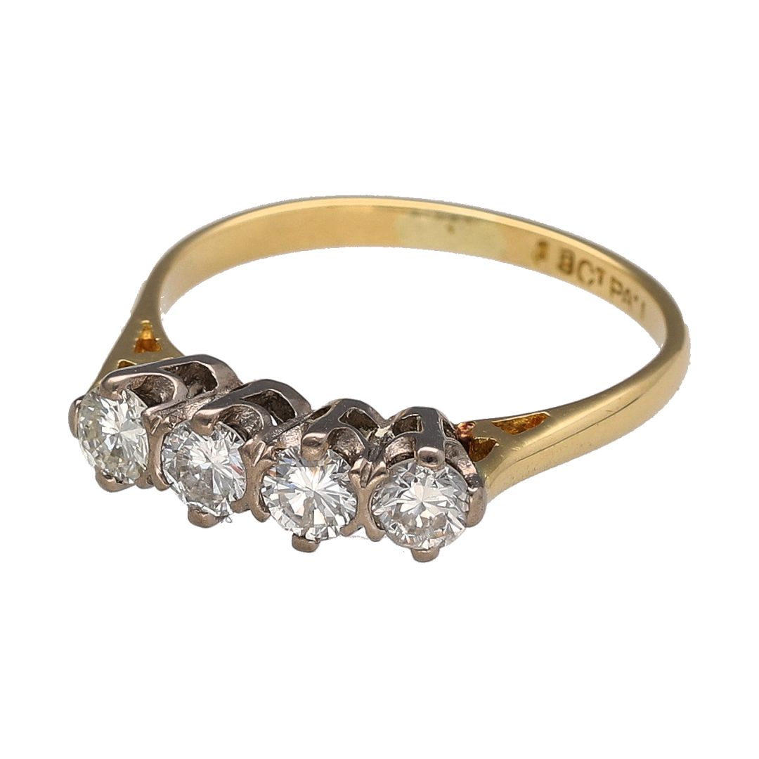 This pre-owned 18ct yellow gold and platinum diamond four stone band ring is a classic two-tone design, featuring four diamonds with approximately 0.84ct of diamond content in total.

Design: Featuring four diamonds set across the front of the band, this ring combines warm 18ct yellow gold with contrasting platinum detailing.
Material: Made from 18-carat yellow gold and platinum.
Gemstone Detail: Four diamonds with approximately 0.84ct of diamond content set in total and approximate SI1 clarity.