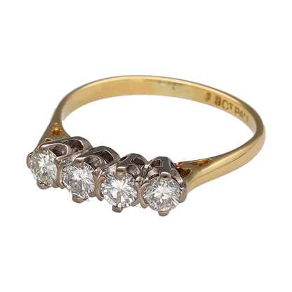 This pre-owned 18ct yellow gold and platinum diamond four stone band ring is a classic two-tone design, featuring four diamonds with approximately 0.84ct of diamond content in total.

Design: Featuring four diamonds set across the front of the band, this ring combines warm 18ct yellow gold with contrasting platinum detailing.
Material: Made from 18-carat yellow gold and platinum.
Gemstone Detail: Four diamonds with approximately 0.84ct of diamond content set in total and approximate SI1 clarity.