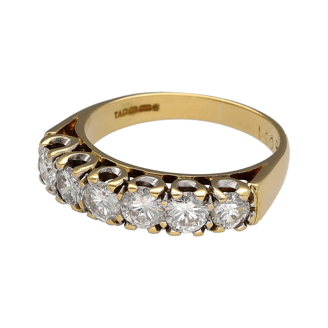 This pre-owned 18ct yellow gold diamond six stone band ring is a classic design, featuring six brilliant cut diamonds with approximately 1ct of diamond content in total.

Design: Featuring six brilliant cut diamonds set across the front of the band, this ring has a timeless design finished in warm 18ct yellow gold.
Material: Made from 18-carat yellow gold.
Gemstone Detail: Six brilliant cut diamonds with approximately 1ct of diamond content set in total.