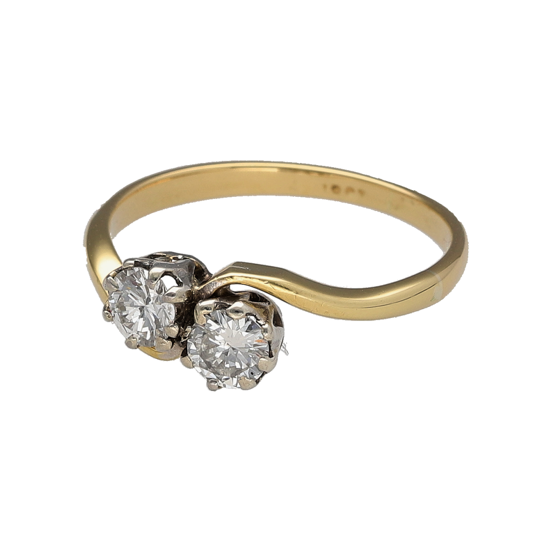 This pre-owned 18ct yellow gold double brilliant cut diamond twist ring is a classic two-stone design, featuring two diamonds within a flowing twist setting.

Design: Featuring two brilliant cut diamonds set within a twist-style design, this ring has a flowing profile finished in warm 18ct yellow gold.
Material: Made from 18-carat yellow gold.
Gemstone Detail: Set with two brilliant cut diamonds.
Ring Detail: Double diamond twist ring design.
Size & Weight: Ring size M to N. Total weight 2.30 grams.