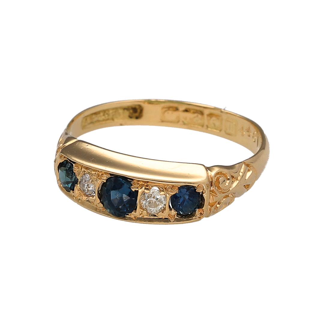 This pre-owned 18ct yellow gold diamond and sapphire vintage band ring is a traditional design, featuring alternating sapphires and diamonds across the front.

Design: Featuring a vintage-style five stone arrangement, this ring has three sapphires and two diamonds set alternately across the front in warm 18ct yellow gold.
Material: Made from 18-carat yellow gold.
Gemstone Detail: Set with three sapphires and two diamonds in an alternating arrangement.