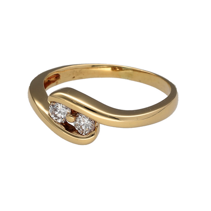This pre-owned 18ct yellow gold double diamond wrap around ring is a distinctive design, featuring two diamonds within a curved wrap-around setting.

Design: Featuring a wrap-around design, this ring curves around the finger with a diamond set at each end for a distinctive open-style appearance.
Material: Made from 18-carat yellow gold.
Gemstone Detail: Set with two diamonds with approximately 0.20ct of diamond content in total.
