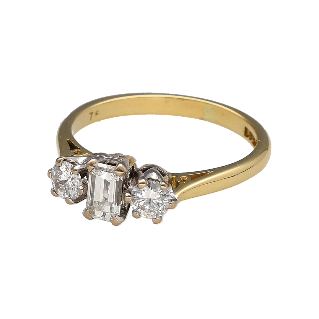 This pre-owned 18ct yellow gold diamond trilogy ring is a timeless design, featuring three diamonds set together across the front of the ring.

Design: Featuring a classic trilogy design, this ring has three diamonds arranged across the front and finished in warm 18ct yellow gold.
Material: Made from 18-carat yellow gold.
Gemstone Detail: Set with three diamonds with approximately 0.70ct of diamond content in total.
Ring Detail: Classic three stone trilogy setting designed to showcase the diamonds.