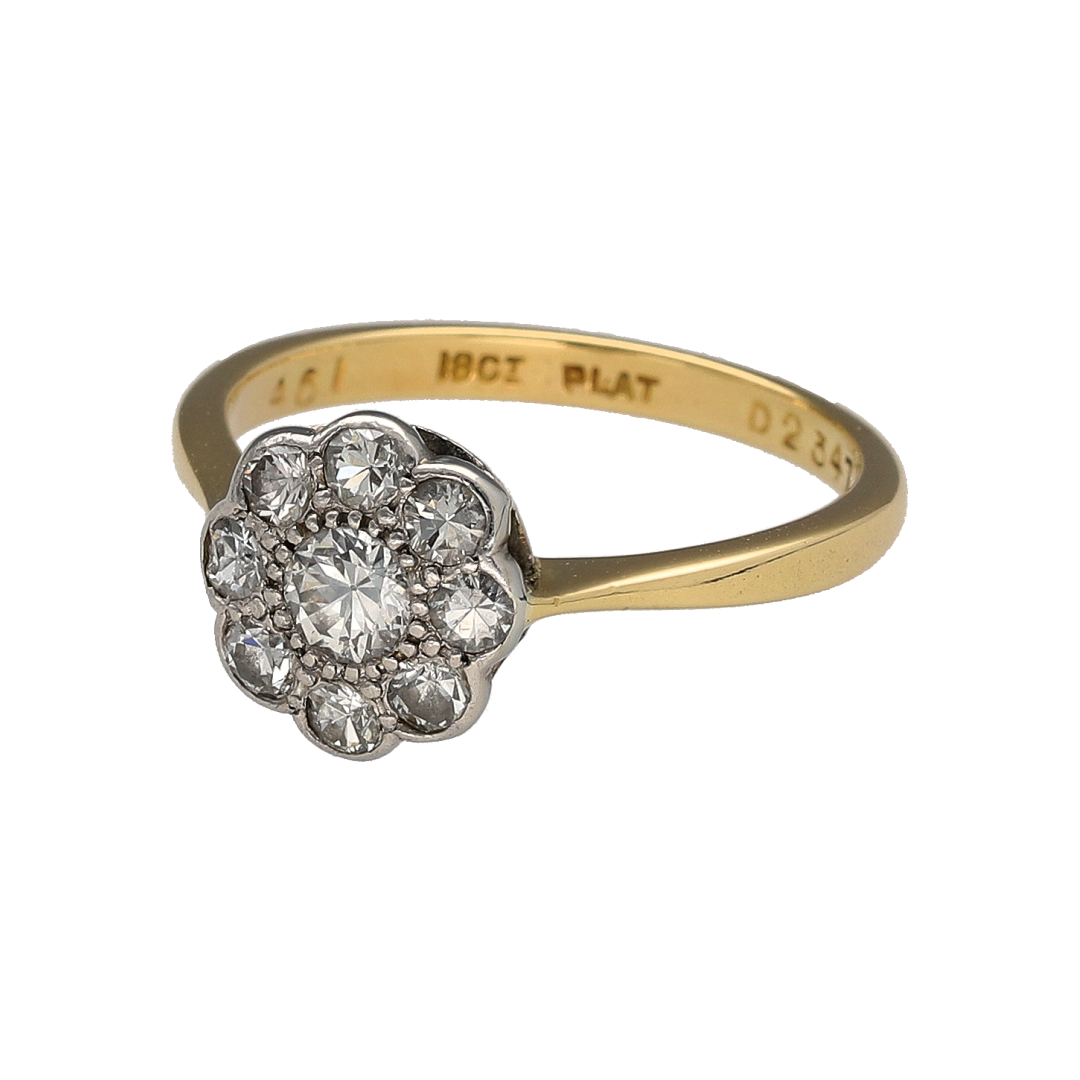 This pre-owned 18ct yellow gold and platinum diamond cluster ring is a classic design, featuring a diamond-set cluster with contrasting precious metal detailing.

Design: Featuring a traditional cluster design, this ring showcases multiple diamonds set within platinum, complemented by a warm 18ct yellow gold band.
Material: Made from 18-carat yellow gold and platinum.
Gemstone Detail: Set with approximately 0.50ct total diamond content across the cluster.