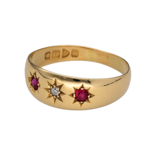 Discover a piece of early 20th-century jewellery with this pre-owned 18ct yellow gold diamond and ruby band ring, featuring a central diamond flanked by two rubies and a Chester hallmark dating the ring to approximately 1913–1914.

Design: The ring features a traditional three-stone arrangement with a diamond at the centre and a ruby positioned on either side, creating a classic combination of rich red colour and diamond detail.