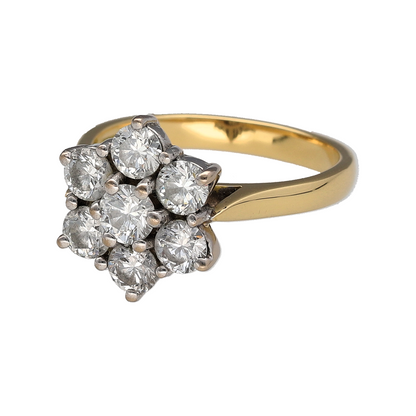 Add a statement diamond piece to your jewellery collection with this pre-owned 18ct yellow gold flower cluster ring, featuring approximately 1.75ct of diamonds in total.

Design: The ring features a classic flower cluster design, with diamonds arranged to create a bold floral-inspired focal point across the front of the ring.
Material: Made from 18-carat yellow gold, the warm gold tone provides a timeless setting for the substantial diamond cluster.
