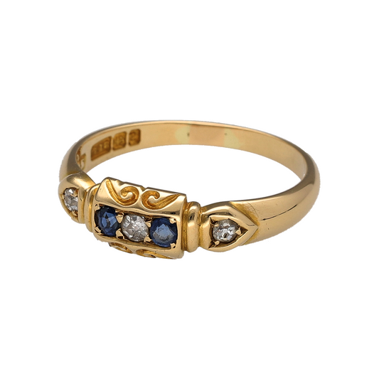 Add vintage character to your jewellery collection with this pre-owned 18ct yellow gold diamond and sapphire boat-style band ring, featuring a traditional setting and classic gemstone combination.

Design: The ring features a vintage boat-style design, with the raised shaped setting creating a distinctive profile across the front of the band.
Material: Made from 18-carat yellow gold, the warm gold tone provides a traditional setting for the sapphire and diamond detailing.