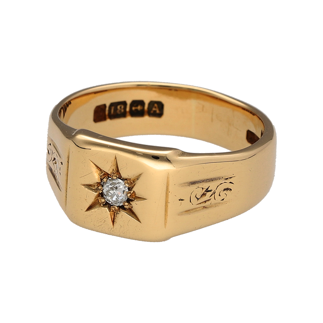 Add a substantial gold piece to your jewellery collection with this pre-owned 18ct yellow gold diamond signet ring, featuring a square front with a brilliant-cut diamond set in the centre.

Design: The ring features a classic square signet design, with a broad front and central diamond creating a simple yet distinctive appearance.
Material: Made from 18-carat yellow gold, the warm gold tone gives the ring a substantial and timeless finish.