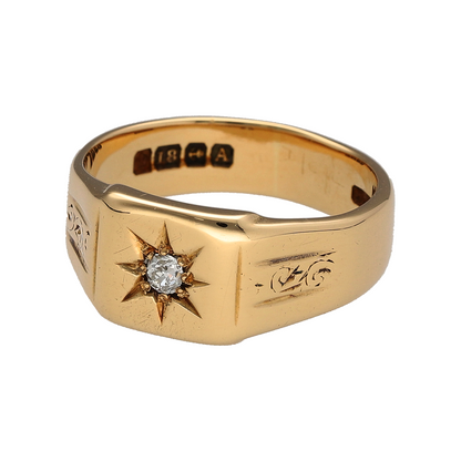 Add a substantial gold piece to your jewellery collection with this pre-owned 18ct yellow gold diamond signet ring, featuring a square front with a brilliant-cut diamond set in the centre.

Design: The ring features a classic square signet design, with a broad front and central diamond creating a simple yet distinctive appearance.
Material: Made from 18-carat yellow gold, the warm gold tone gives the ring a substantial and timeless finish.