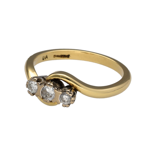 Add classic diamond detail to your jewellery collection with this pre-owned 18ct yellow gold diamond trilogy twist ring, featuring approximately 0.25ct of diamonds in total.

Design: The ring features a trilogy design with a flowing twist-style setting, creating an elegant and distinctive three-stone appearance.
Material: Made from 18-carat yellow gold, the warm gold tone provides a timeless setting for the diamonds.