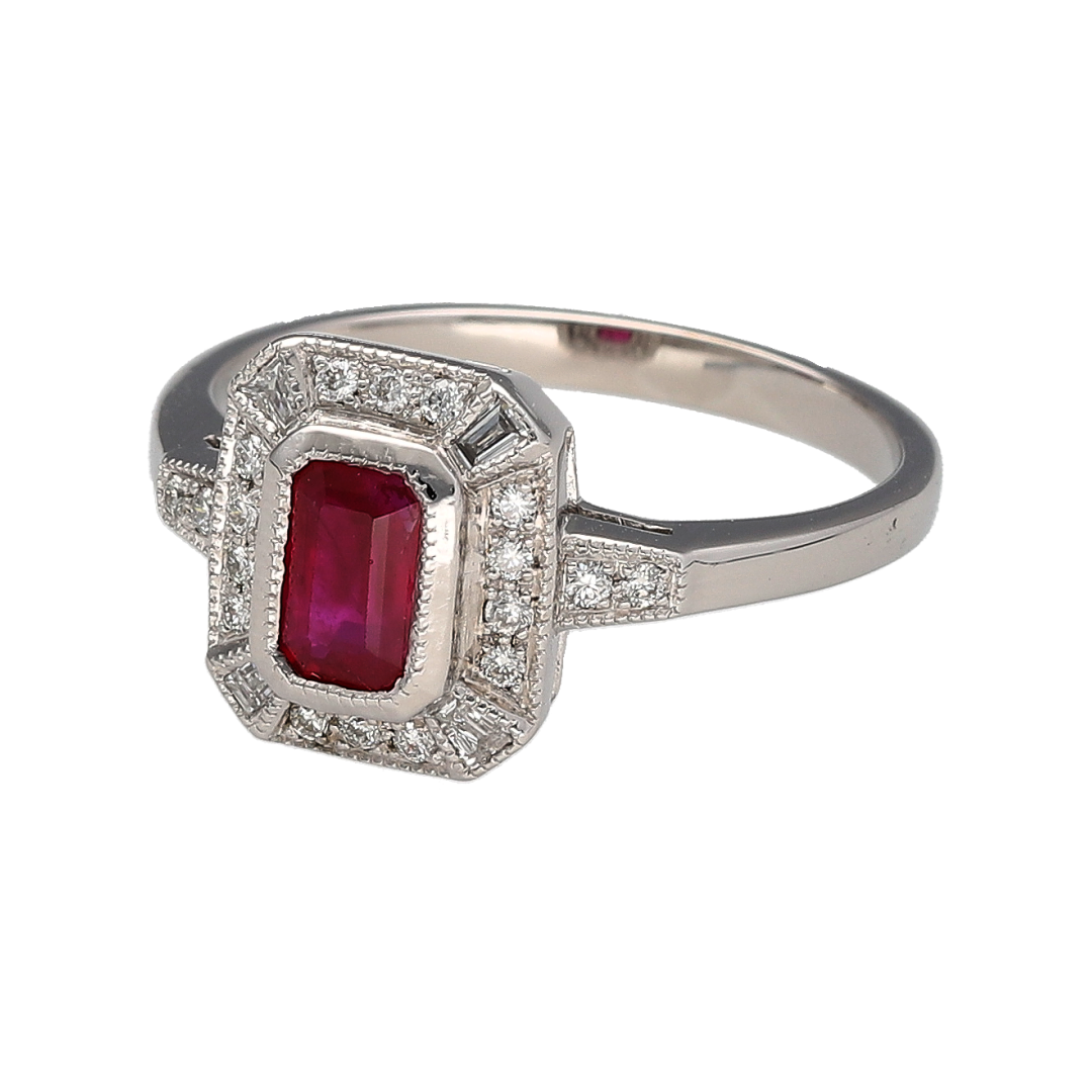 Add a distinctive vintage-inspired piece to your jewellery collection with this pre-owned 18ct white gold diamond and ruby Art Deco-style ring, featuring a rectangular ruby as its central focal point.

Design: The ring features an Art Deco-style design with a geometric appearance, centred around a rectangular ruby and complemented by diamond detailing.
Material: Made from 18-carat white gold, the bright white finish complements the rich red tone of the ruby and surrounding diamonds.