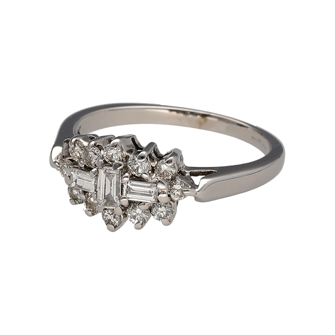 Add a distinctive diamond piece to your jewellery collection with this pre-owned 18ct white gold cluster ring, featuring a combination of baguette and brilliant-cut diamonds.

Design: The ring features a cluster design combining baguette and brilliant-cut diamonds, creating an eye-catching arrangement across the front of the ring.
Material: Made from 18-carat white gold, the bright white finish complements the diamonds and gives the ring a classic appearance.