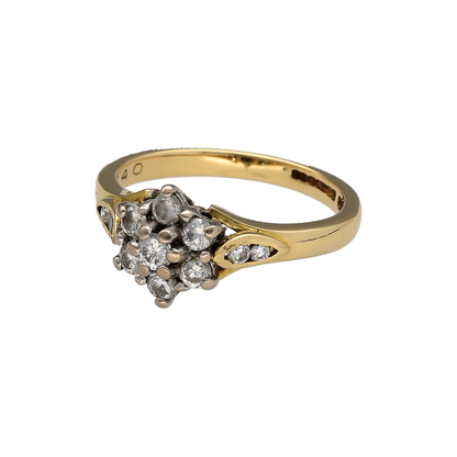 Add an elegant piece to your jewellery collection with this pre-owned 18ct yellow gold and diamond flower cluster ring, featuring a floral design with approximately 0.40ct of diamonds.

Design: The ring features a classic flower-shaped cluster, with diamonds arranged to create a delicate and timeless floral appearance.
Material: Made from 18ct yellow gold, offering a warm gold finish that complements the diamonds.