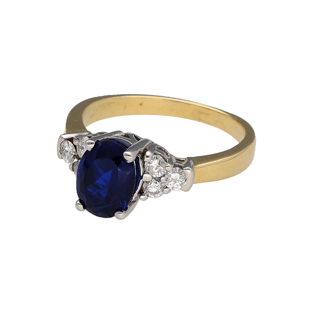 Add a classic piece to your jewellery collection with this pre-owned 18ct yellow gold diamond and sapphire ring, featuring a beautiful oval sapphire complemented by six diamonds.

Design: The ring features a central oval sapphire with three diamonds set on either side, creating an elegant and balanced design.
Material: Made from 18ct yellow gold, offering a warm gold finish that complements the sapphire and diamonds.