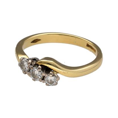 Add an elegant touch to your jewellery collection with this pre-owned 18ct yellow gold and diamond trilogy twist ring, featuring three beautiful diamonds set within a graceful twisted band design.

Design: The ring features a classic trilogy design with a distinctive twist, combining three diamonds with flowing gold detailing for an elegant and timeless appearance.
Material: Made from 18ct yellow gold, offering a rich, warm gold finish that beautifully complements the diamonds.