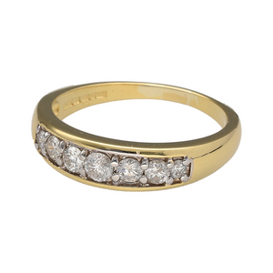 Preowned 18ct Yellow and White Gold & Diamond Set Seven Stone Band Ring in size P with the weight 4.60 grams. There is approximately 49pt of diamond content with approximate clarity Si and colour J - K