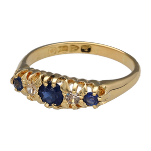 Preowned 18ct Yellow Gold Diamond & Sapphire Set Chester Hallmarked Vintage Ring in size R with the weight 4.30 grams. The center sapphire stone is 5mm diameter