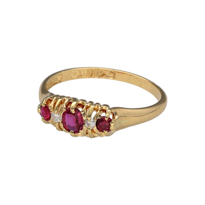 Preowned 18ct Yellow Gold Diamond & Ruby Set Chester Hallmarked Boat Style Ring in size O with the weight 2.90 grams. The center ruby stone is 5mm by 4mm