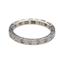 Load image into Gallery viewer, Add a touch of timeless elegance to your jewellery collection with this pre-owned 18ct white gold &amp; diamond set full eternity band ring, featuring:

Design: A classic full eternity band, symbolising everlasting love and commitment.
Material: Crafted in 18-carat white gold, offering a sleek and polished finish.
Gemstone Detail: Set with sparkling diamonds, creating a continuous band of brilliance.
Ring Width: Measures 3mm wide, providing a refined and elegant appearance.

