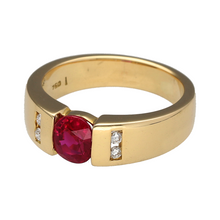 Load image into Gallery viewer, Add a bold and elegant touch to your jewellery collection with this pre-owned 18ct yellow gold diamond &amp; ruby set band ring, featuring:

Design: A classic and sophisticated band-style ring, perfect for timeless elegance.
Material: Crafted in 18-carat yellow gold, offering a rich and luxurious finish.
Gemstone Arrangement: Showcases a striking 6mm by 5mm ruby, radiating deep red brilliance.
Diamond Accents: Sparkling diamonds complement the ruby, adding elegance and sophistication.

