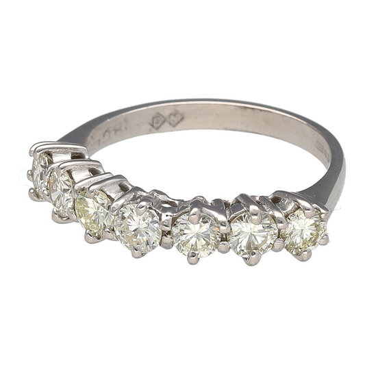 Add a touch of brilliance to your jewellery collection with this pre-owned 18ct white gold & diamond set seven-stone band ring, featuring:

Design: A classic seven-stone band, offering timeless elegance and radiant sparkle.
Material: 18-carat white gold, providing a sleek and polished finish.
Gemstone Detail: Set with approximately 1.05ct total diamond content in brilliant-cut diamonds, ensuring dazzling brilliance.
Diamond Quality: Estimated SI1 clarity and K-M colour