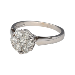 Add a touch of elegance to your jewellery collection with this pre-owned 18ct white gold & diamond set illusion cluster solitaire ring.

Design: A stunning illusion cluster design that creates the appearance of a larger diamond, with a central sparkling solitaire surrounded by smaller diamonds for a captivating look.
Material: Crafted from 18-carat white gold, offering a sleek and polished finish that enhances the brilliance of the diamonds.
