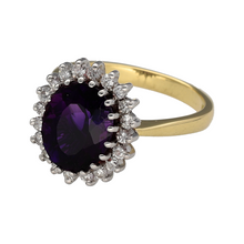 Load image into Gallery viewer, Add luxurious colour and sparkle to your jewellery collection with this pre-owned 18ct yellow gold diamond and amethyst set cluster ring, featuring:

Design: A classic cluster style with a richly coloured centre stone surrounded by diamonds for a timeless, elegant look.
Material: 18-carat yellow gold, offering a rich and polished finish that enhances the brilliance of the stones.
Gemstone Detail: Features an 11mm by 9mm oval amethyst at the centre, beautifully framed by a halo of sparkling diamonds.
