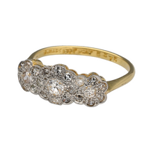 Load image into Gallery viewer, Celebrate timeless beauty and romantic symbolism with this pre-owned 18ct yellow gold and platinum diamond trilogy flower cluster ring, featuring:

Design: A refined trilogy design with three floral clusters, each centred with sparkling diamonds—symbolising the past, present, and future in a delicate and elegant arrangement.
Material: Crafted from rich 18-carat yellow gold with platinum settings, offering a luxurious contrast and enhanced brilliance.

