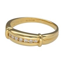 Load image into Gallery viewer, Add refined brilliance and timeless style to your jewellery collection with this pre-owned 18ct yellow gold diamond set band ring, featuring:

Design: A classic band with elegant gold detailing on the shoulders and a sparkling diamond accent at the centre, combining traditional craftsmanship with a luxurious finish.
Material: 18-carat yellow gold, offering a rich, polished appearance and exceptional durability.
Gemstone Detail: Set with a central diamond, adding subtle sparkle and sophistication.

