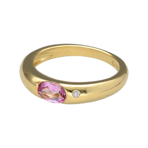 Add a touch of colour and elegance to your jewellery collection with this pre-owned 18ct yellow gold diamond and pink sapphire band ring, featuring:

Design: A refined band style with a central pink sapphire framed by a sparkling diamond, offering a perfect balance of vibrancy and sophistication.
Material: 18-carat yellow gold, providing a rich and polished setting that enhances the beauty of the gemstones.

