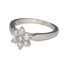 Load image into Gallery viewer, Add timeless sparkle and floral elegance to your jewellery collection with this pre-owned 18ct white gold diamond set flower cluster ring, offering classic charm and radiant brilliance, featuring:

Design: A beautifully arranged flower cluster design, with diamonds forming delicate petals for a soft, elegant silhouette that catches the light from every angle.
Material: Made from 18-carat white gold, the polished finish enhances the brightness of the setting and complements the brilliance of the diamonds.
