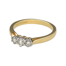 Load image into Gallery viewer, Celebrate life’s most meaningful moments with this pre-owned 18ct yellow gold diamond set trilogy ring, symbolising the past, present, and future in timeless style, featuring:

Design: A classic trilogy ring showcasing three brilliant-cut diamonds in a refined and balanced setting, offering elegant sparkle with lasting significance.
Material: Made from luxurious 18-carat yellow gold, the polished finish enhances the warmth of the metal and the brilliance of the diamonds.

