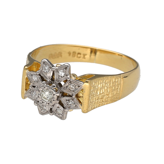 Add timeless floral elegance to your jewellery collection with this pre-owned 18ct yellow and white gold diamond set flower cluster ring, offering a radiant design full of sparkle and charm:

Design: A classic flower cluster design, with brilliant-cut diamonds arranged in a blooming floral shape for a look that is both romantic and refined. The white gold setting enhances the brightness of the diamonds, while the yellow gold band adds warmth and contrast.
