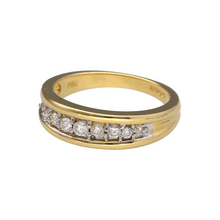 Load image into Gallery viewer, Bring refined brilliance to your collection with this pre-owned 18ct yellow gold diamond set band ring, offering elegant sparkle and timeless craftsmanship—perfect for everyday luxury or marking a special moment.

Design: The front of the band features a series of sparkling diamonds totalling approximately 0.27 carats, set into a wide 6mm band for a sophisticated and balanced look.


