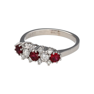 Bring rich colour and elegant sparkle to your collection with this pre-owned 18ct white gold diamond and ruby set cluster style band ring, blending classic design with vibrant detail—perfect for special occasions or timeless everyday wear.

Design: The ring features three vivid round ruby stones, each 3.5mm in diameter, interspaced with ten brilliant-cut diamonds in a cluster style setting for a beautifully balanced and luxurious look.