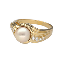 Load image into Gallery viewer, Bring timeless elegance and refined beauty to your collection with this pre-owned 18ct yellow gold diamond and pearl set ring, featuring a classic design with luxurious detail—perfect for special occasions or sophisticated everyday wear.

Design: The ring showcases an 8mm round pearl as its centrepiece, flanked by diamond-set shoulders that add delicate sparkle and graceful balance to the design.
