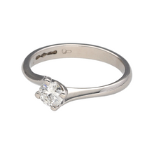 Load image into Gallery viewer, Bring modern elegance and timeless brilliance to your collection with this pre-owned platinum diamond set twist solitaire ring, featuring a graceful design with classic sparkle—perfect for engagements, anniversaries, or refined everyday wear.

Design: The ring showcases a brilliant-cut diamond of approximately 0.36 carats, set in a sleek twist design that gently wraps around the stone for a soft, contemporary look.

